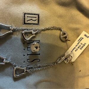 Gorgeous earrings with diamond accents on bottom bar $1200 retail